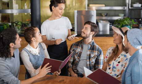 Waitress taking order